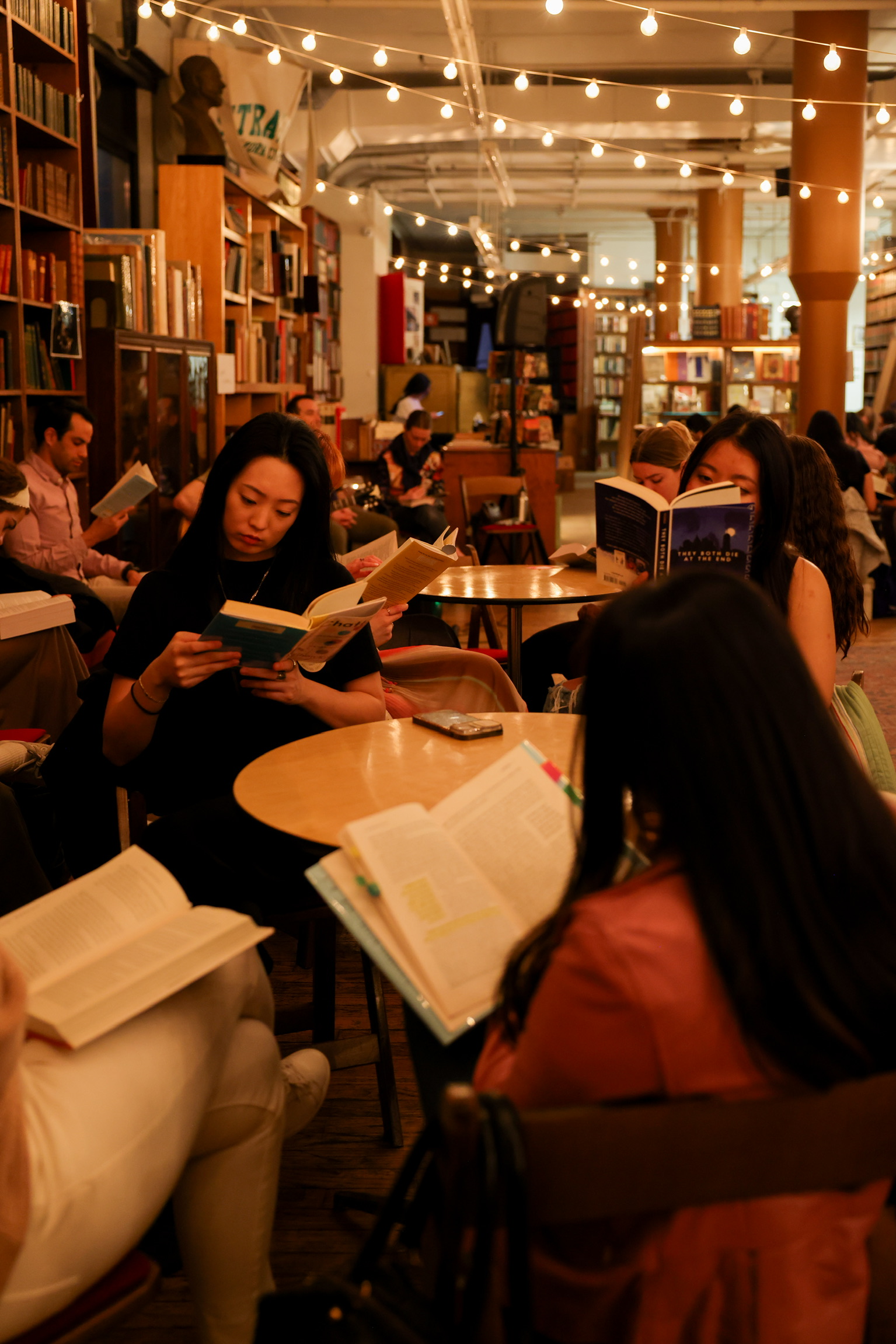 Readers at a reading party in a bookstore